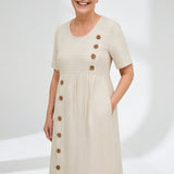 Linéora™ — Robe rayée fluide au charme estival