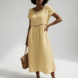 Pernelle™ | Robe mi-longue 100% coton brodée féminité douce